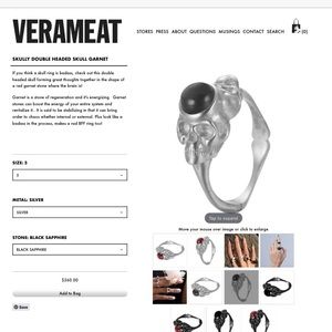 Verameat skull double head ring with onyx setting